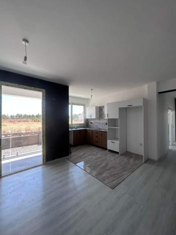 MAĞUSA ÇANAKKALE'DE ZEMİNKAT BAHÇELİ SATILIK DAİRE 