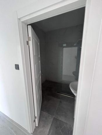 MAĞUSA ÇANAKKALE'DE ZEMİNKAT BAHÇELİ SATILIK DAİRE 