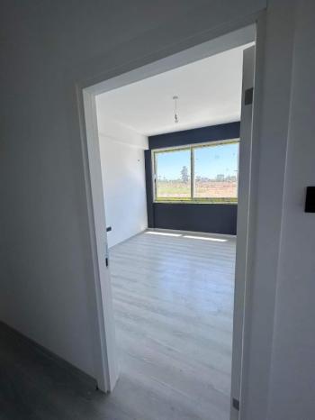 MAĞUSA ÇANAKKALE'DE ZEMİNKAT BAHÇELİ SATILIK DAİRE 