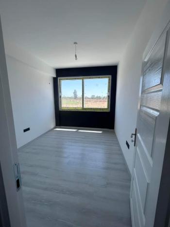 MAĞUSA ÇANAKKALE'DE ZEMİNKAT BAHÇELİ SATILIK DAİRE 