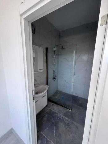 MAĞUSA ÇANAKKALE'DE ZEMİNKAT BAHÇELİ SATILIK DAİRE 