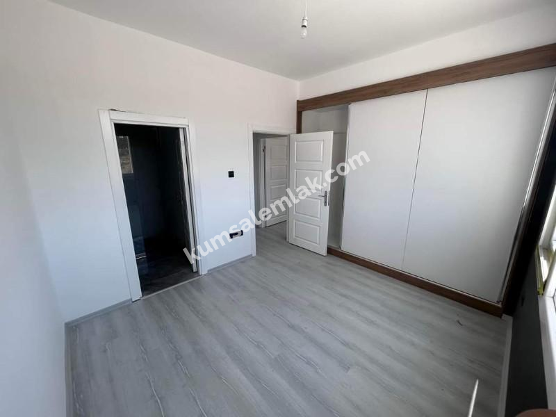 MAĞUSA ÇANAKKALE'DE ZEMİNKAT BAHÇELİ SATILIK DAİRE 