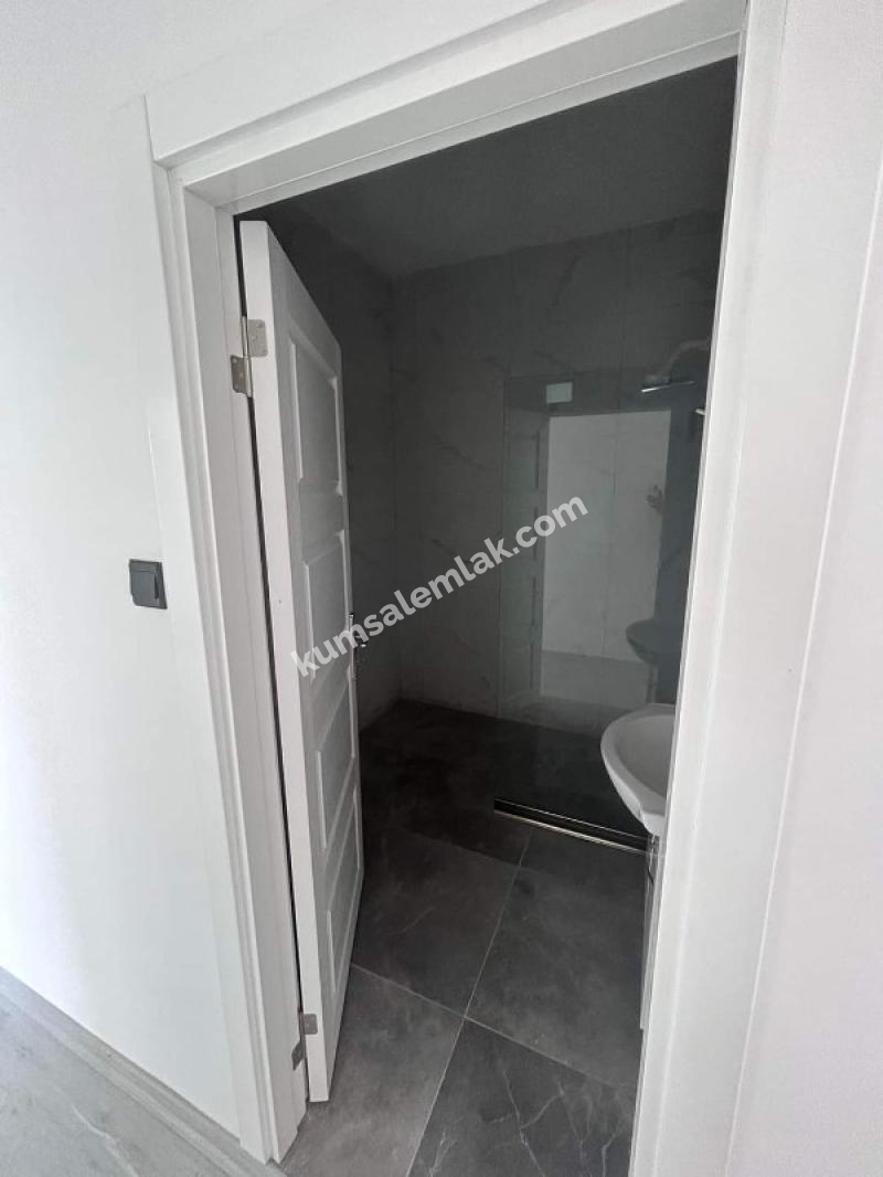 MAĞUSA ÇANAKKALE'DE ZEMİNKAT BAHÇELİ SATILIK DAİRE 