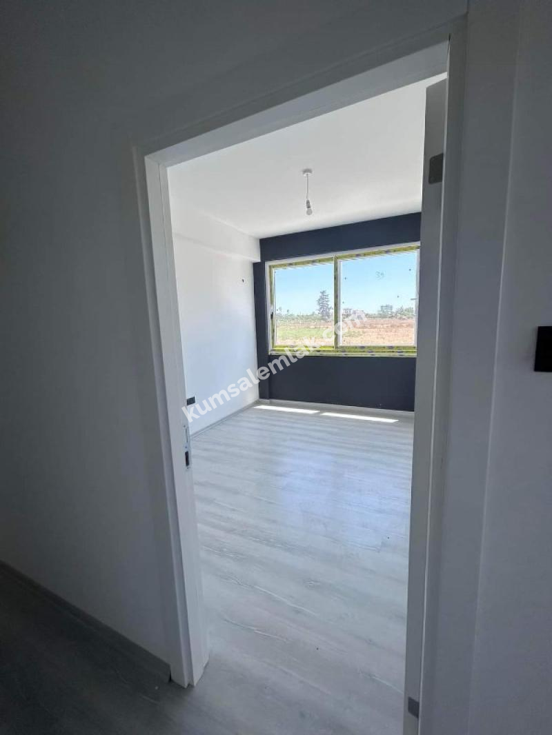 MAĞUSA ÇANAKKALE'DE ZEMİNKAT BAHÇELİ SATILIK DAİRE 