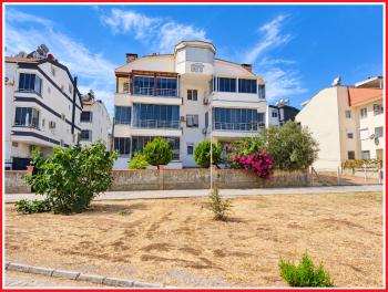 Didim Yeni Mahalle Deniz Evleri'nde Park Cepheli Geniş Balkonlu 2+1 Satılık Daire