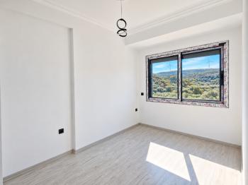 Didim Akyeniköy’de Kiralık Sıfır 1+1 Daire | Havuzlu, Asansörlü, Doğa Manzaralı