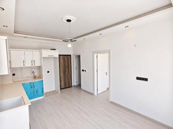 Didim Akyeniköy’de Kiralık Sıfır 1+1 Daire | Havuzlu, Asansörlü, Doğa Manzaralı