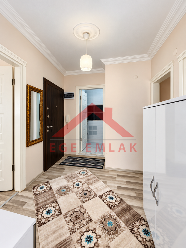 Didim Yeni Mahalle Deniz Evleri'nde Park Cepheli Geniş Balkonlu 2+1 Satılık Daire