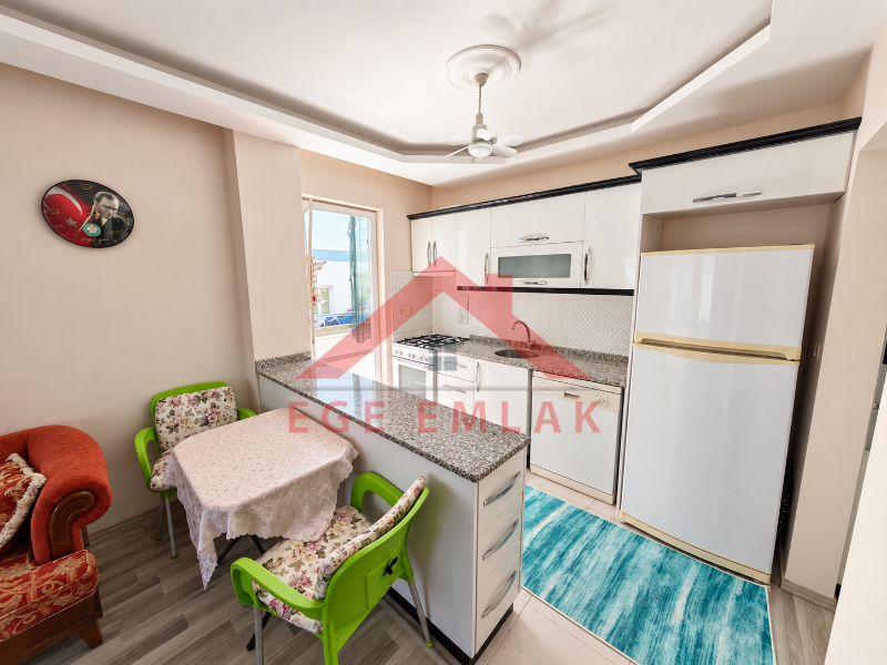 Didim Yeni Mahalle Deniz Evleri'nde Park Cepheli Geniş Balkonlu 2+1 Satılık Daire
