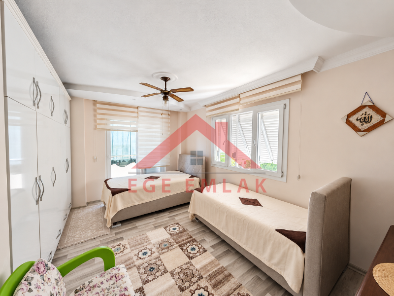 Didim Yeni Mahalle Deniz Evleri'nde Park Cepheli Geniş Balkonlu 2+1 Satılık Daire