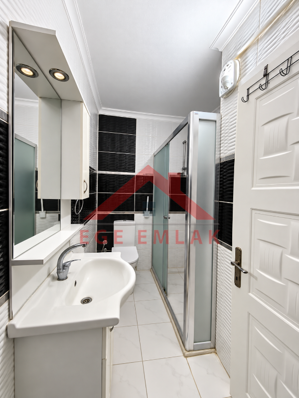 Didim Yeni Mahalle Deniz Evleri'nde Park Cepheli Geniş Balkonlu 2+1 Satılık Daire