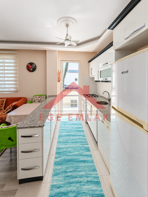 Didim Yeni Mahalle Deniz Evleri'nde Park Cepheli Geniş Balkonlu 2+1 Satılık Daire