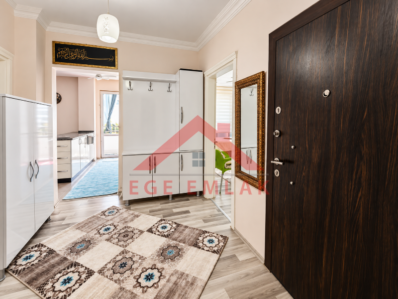 Didim Yeni Mahalle Deniz Evleri'nde Park Cepheli Geniş Balkonlu 2+1 Satılık Daire